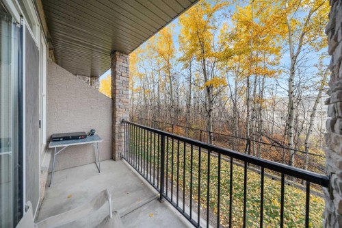 1111-211 Aspen Stone Boulevard Sw, Calgary, AB - Outdoor With Exterior