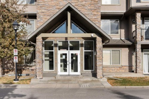 1111-211 Aspen Stone Boulevard Sw, Calgary, AB - Outdoor With Facade