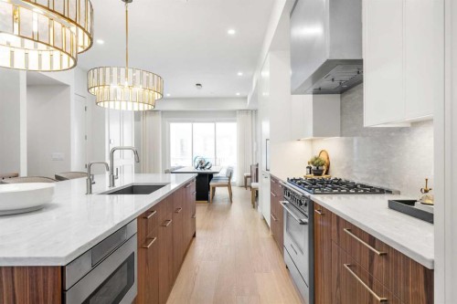 40 Greenwich Heath Nw, Calgary, AB - Indoor Photo Showing Kitchen With Upgraded Kitchen