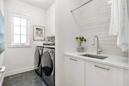 40 Greenwich Heath Nw, Calgary, AB - Indoor Photo Showing Laundry Room