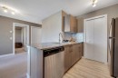 4206-4641 128 Avenue Ne, Calgary, AB  - Indoor Photo Showing Kitchen With Stainless Steel Kitchen 