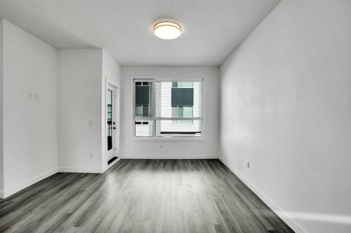 105 Panatella Square Nw, Calgary, AB - Indoor Photo Showing Other Room