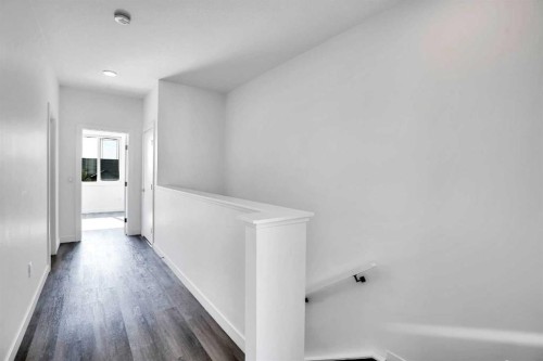 105 Panatella Square Nw, Calgary, AB - Indoor Photo Showing Other Room