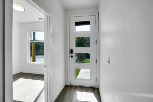 105 Panatella Square Nw, Calgary, AB - Indoor Photo Showing Other Room