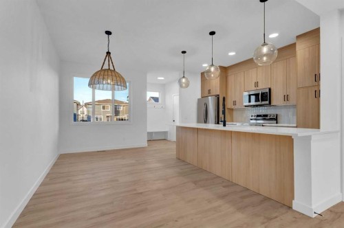 164 Cobblestone Gate Sw, Airdrie, AB - Indoor Photo Showing Kitchen With Upgraded Kitchen