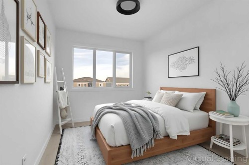 164 Cobblestone Gate Sw, Airdrie, AB - Indoor Photo Showing Bedroom