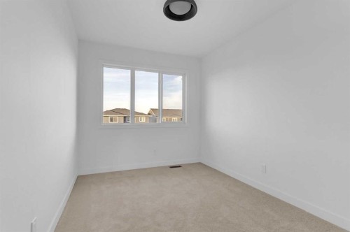 164 Cobblestone Gate Sw, Airdrie, AB - Indoor Photo Showing Other Room