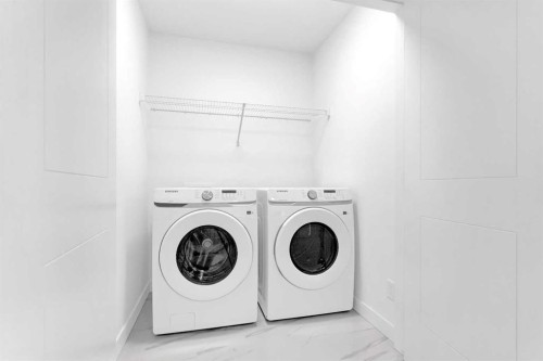 164 Cobblestone Gate Sw, Airdrie, AB - Indoor Photo Showing Laundry Room