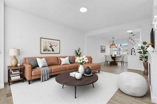 164 Cobblestone Gate Sw, Airdrie, AB - Indoor Photo Showing Living Room