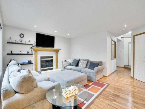 151 Citadel Park Nw, Calgary, AB - Indoor Photo Showing Living Room With Fireplace