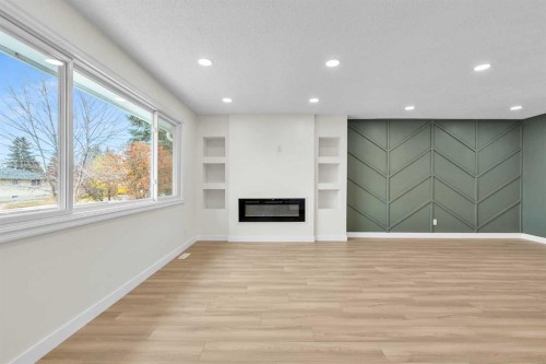 220 60 Street Se, Calgary, AB - Indoor Photo Showing Other Room With Fireplace