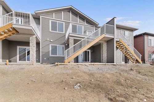 27 Wolf Crescent, Okotoks, AB - Outdoor With Exterior