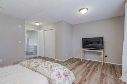 8 Millbank Road Sw, Calgary, AB - Indoor Photo Showing Bedroom