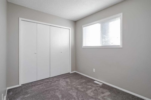 8 Millbank Road Sw, Calgary, AB - Indoor Photo Showing Other Room