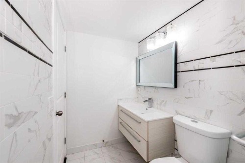141 Falshire Close Ne, Calgary, AB - Indoor Photo Showing Bathroom