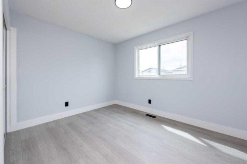 141 Falshire Close Ne, Calgary, AB - Indoor Photo Showing Other Room