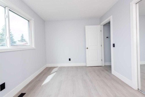 141 Falshire Close Ne, Calgary, AB - Indoor Photo Showing Other Room