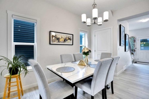 1457 Bayview Point Sw, Airdrie, AB - Indoor Photo Showing Dining Room