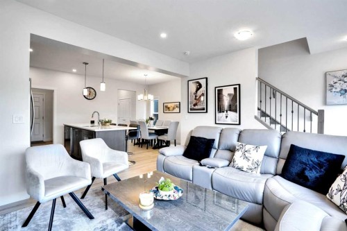 1457 Bayview Point Sw, Airdrie, AB - Indoor Photo Showing Living Room