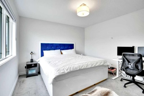 1457 Bayview Point Sw, Airdrie, AB - Indoor Photo Showing Bedroom