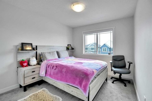 1457 Bayview Point Sw, Airdrie, AB - Indoor Photo Showing Bedroom