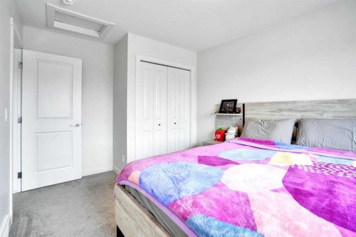 1457 Bayview Point Sw, Airdrie, AB - Indoor Photo Showing Bedroom