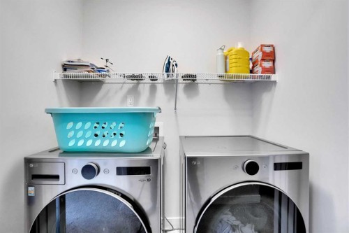 1457 Bayview Point Sw, Airdrie, AB - Indoor Photo Showing Laundry Room