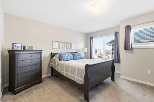 146 Red Embers Gate Ne, Calgary, AB - Indoor Photo Showing Bedroom
