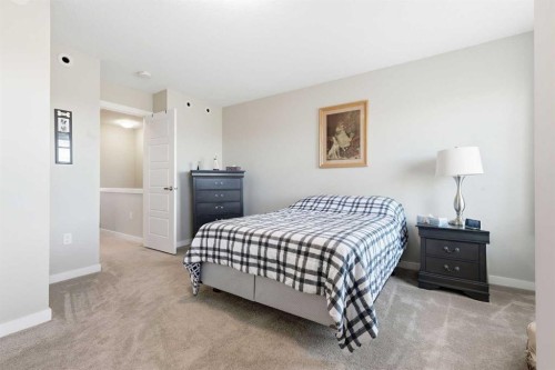146 Red Embers Gate Ne, Calgary, AB - Indoor Photo Showing Bedroom