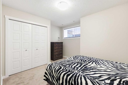146 Red Embers Gate Ne, Calgary, AB - Indoor Photo Showing Bedroom