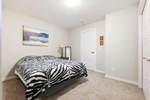 146 Red Embers Gate Ne, Calgary, AB - Indoor Photo Showing Bedroom