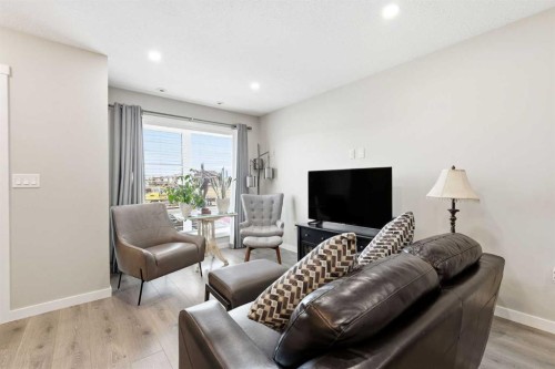 146 Red Embers Gate Ne, Calgary, AB - Indoor Photo Showing Living Room