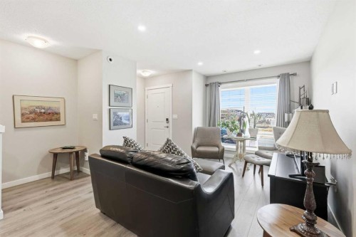 146 Red Embers Gate Ne, Calgary, AB - Indoor Photo Showing Living Room