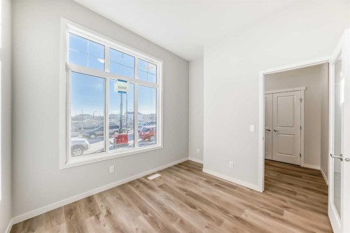 1058 Sawgrass Link Nw, Airdrie, AB - Indoor Photo Showing Other Room