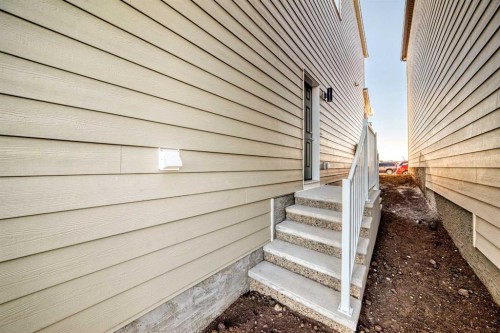 1058 Sawgrass Link Nw, Airdrie, AB - Outdoor With Exterior