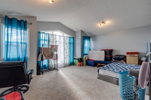 47 Westmount Road, Okotoks, AB - Indoor Photo Showing Bedroom