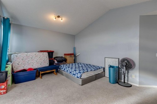 47 Westmount Road, Okotoks, AB - Indoor Photo Showing Bedroom