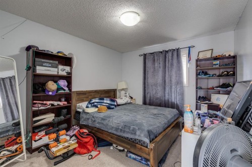 47 Westmount Road, Okotoks, AB - Indoor Photo Showing Bedroom