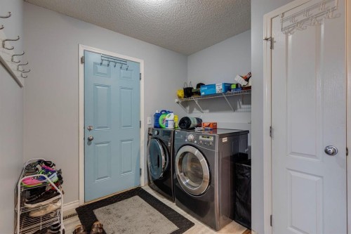 47 Westmount Road, Okotoks, AB - Indoor Photo Showing Laundry Room
