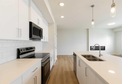 5403-20295 Seton Way Se, Calgary, AB - Indoor Photo Showing Kitchen With Double Sink With Upgraded Kitchen