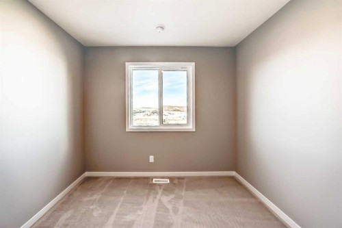 1054 Sawgrass Link Nw, Airdrie, AB - Indoor Photo Showing Other Room