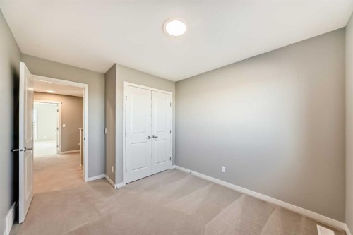 1054 Sawgrass Link Nw, Airdrie, AB - Indoor Photo Showing Other Room