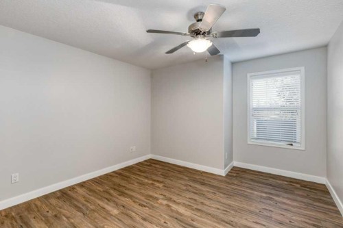 13-24 River Heights View, Cochrane, AB - Indoor Photo Showing Other Room