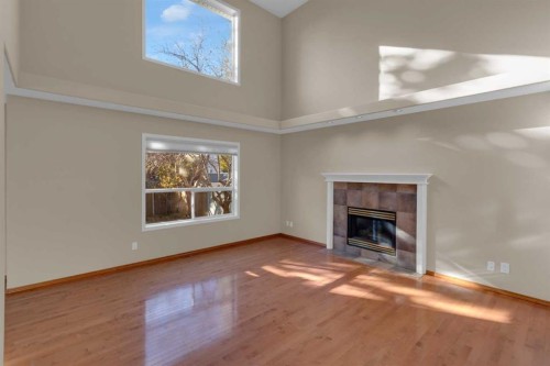 202 Citadel Circle Nw, Calgary, AB - Indoor Photo Showing Living Room With Fireplace