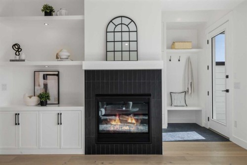 5007 21 Avenue Nw, Calgary, AB - Indoor Photo Showing Living Room With Fireplace