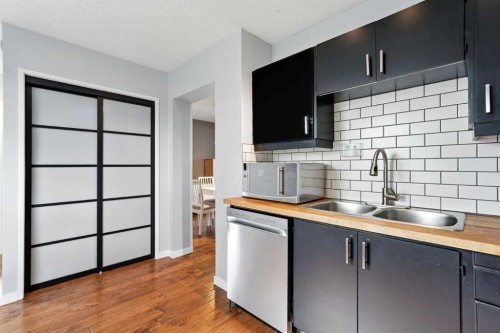 123 Silverstone Road Nw, Calgary, AB - Indoor Photo Showing Kitchen With Double Sink