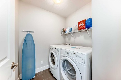 14 Evansfield Road Nw, Calgary, AB - Indoor Photo Showing Laundry Room