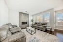 14 Evansfield Road Nw, Calgary, AB  - Indoor Photo Showing Living Room With Fireplace 