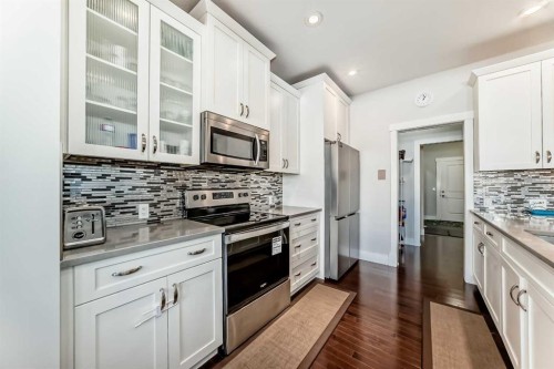 14 Evansfield Road Nw, Calgary, AB - Indoor Photo Showing Kitchen With Stainless Steel Kitchen With Upgraded Kitchen