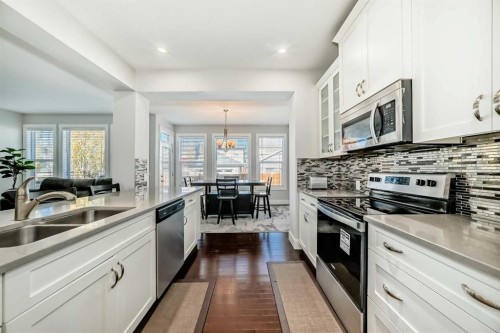 14 Evansfield Road Nw, Calgary, AB - Indoor Photo Showing Kitchen With Stainless Steel Kitchen With Double Sink With Upgraded Kitchen